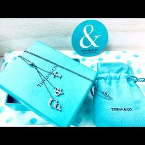 ✅ SOLD! ✅Tiffany Co Sterling Silver T&CO Letters Lariat Dangle Pendant